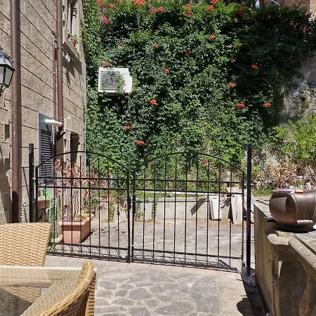 In A Beautiful Etruscan Village Suspended Between Sky And Sea A Castle On The Archipelago